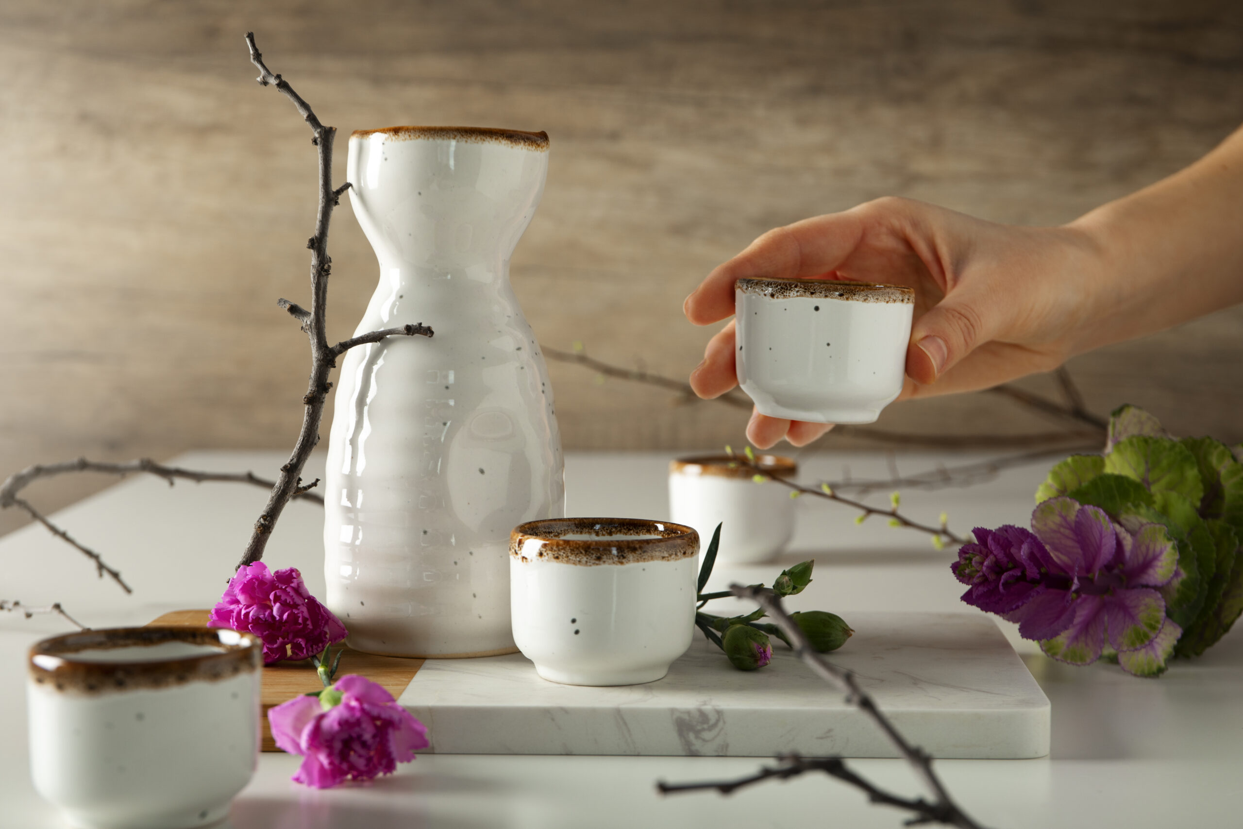 The “Three Ways” of Japan: Tea, Flowers, and Calligraphy Explained preparing-sake-japanese-beverage